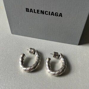 BALENCIAGA twist logo silver brass hoop earrings